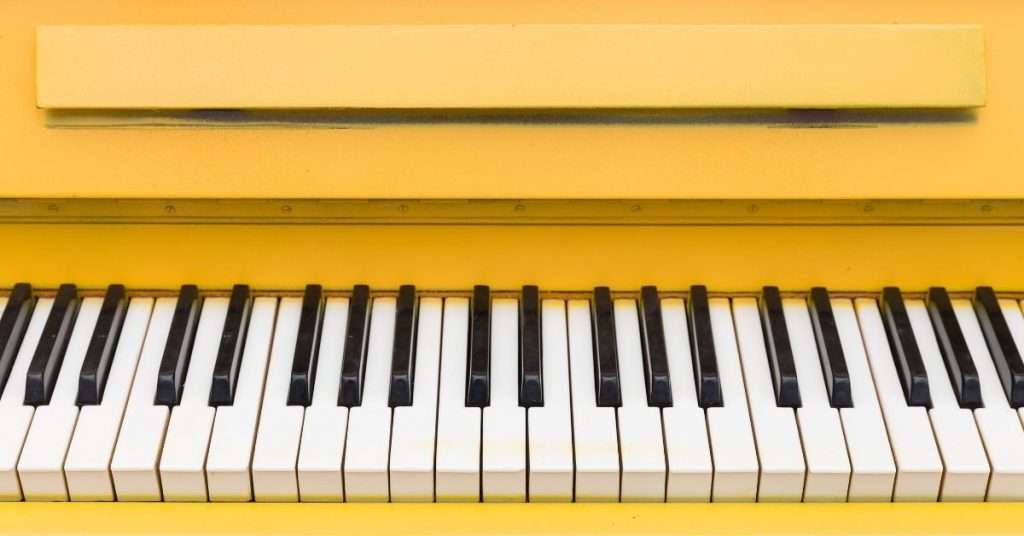 yellow vintage antique piano