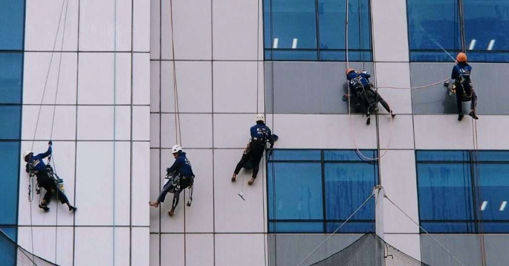 abseiling down building