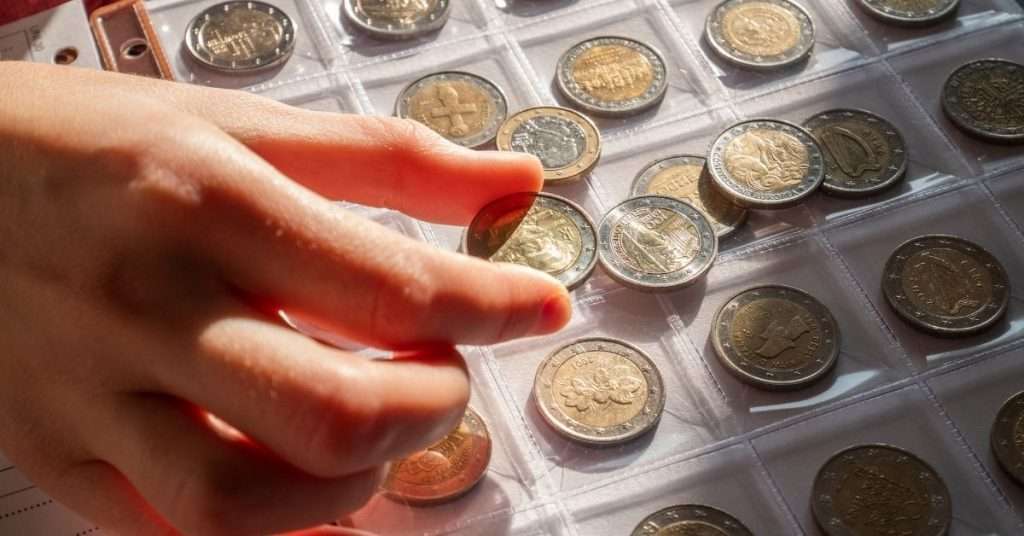 coin collection organized in book